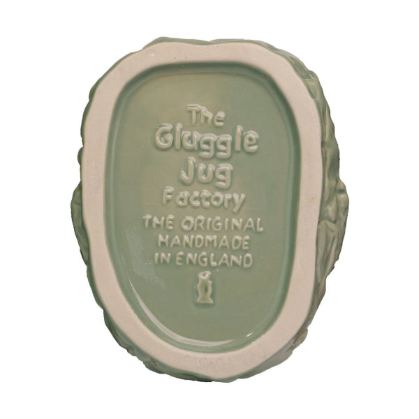 Green ceramic product with 'The Gluggle Jug Factory' branding on a white background