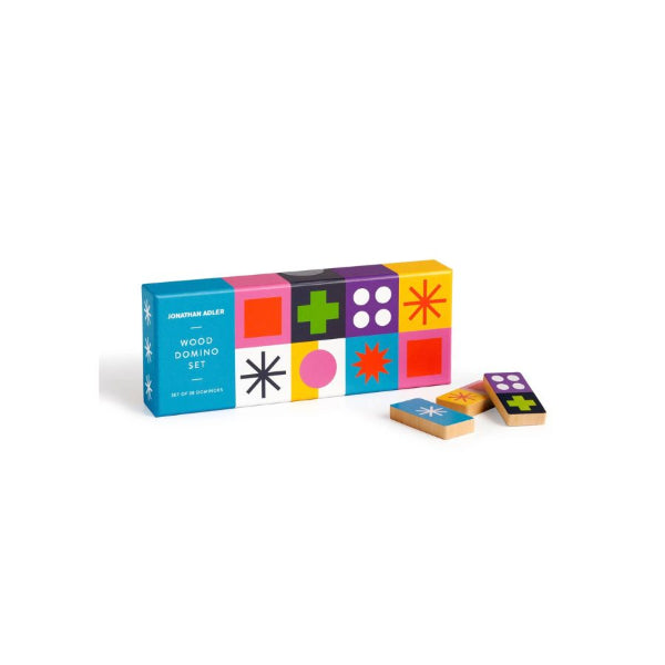 Jonathan Adler Wood Domino Set with its colorful geometric patterned box and three wooden domino pieces displayed on a clean white background.